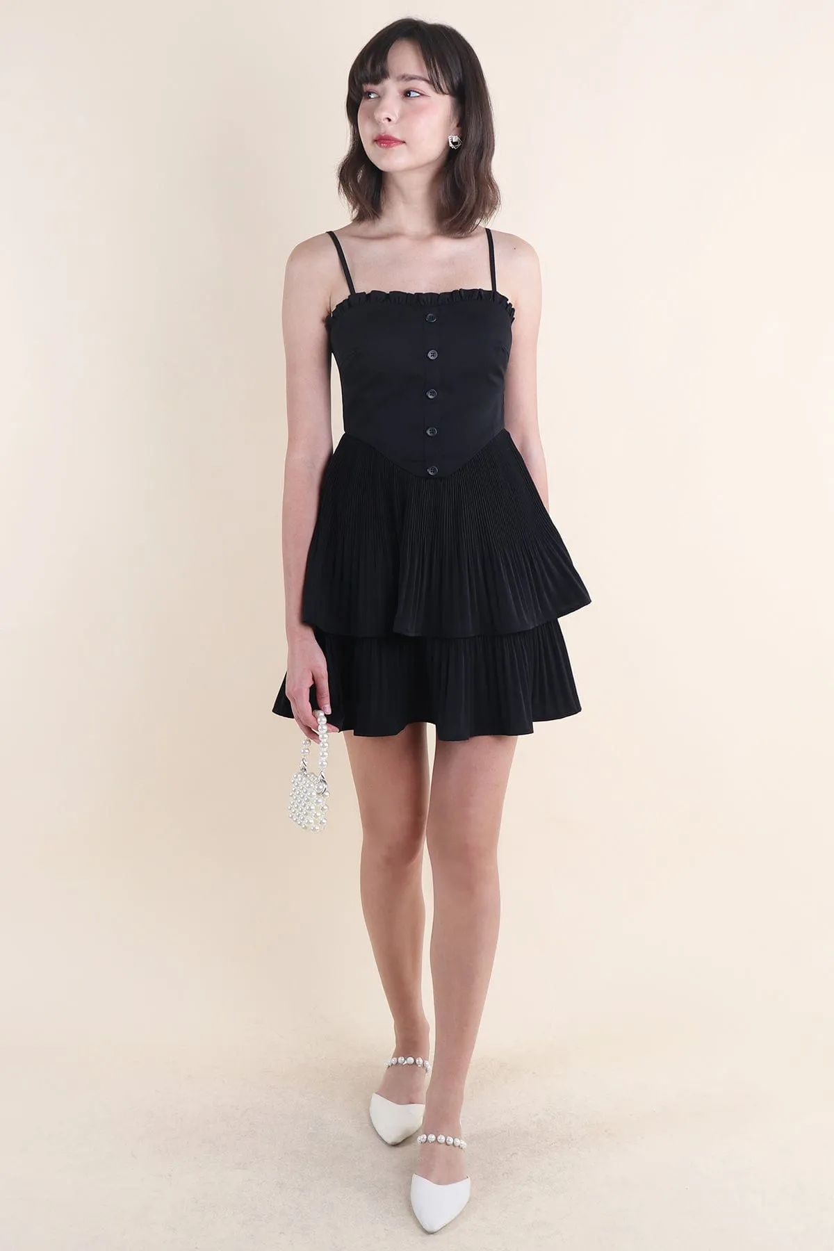 BEVELYN PLEATED MINI DRESS IN BLACK